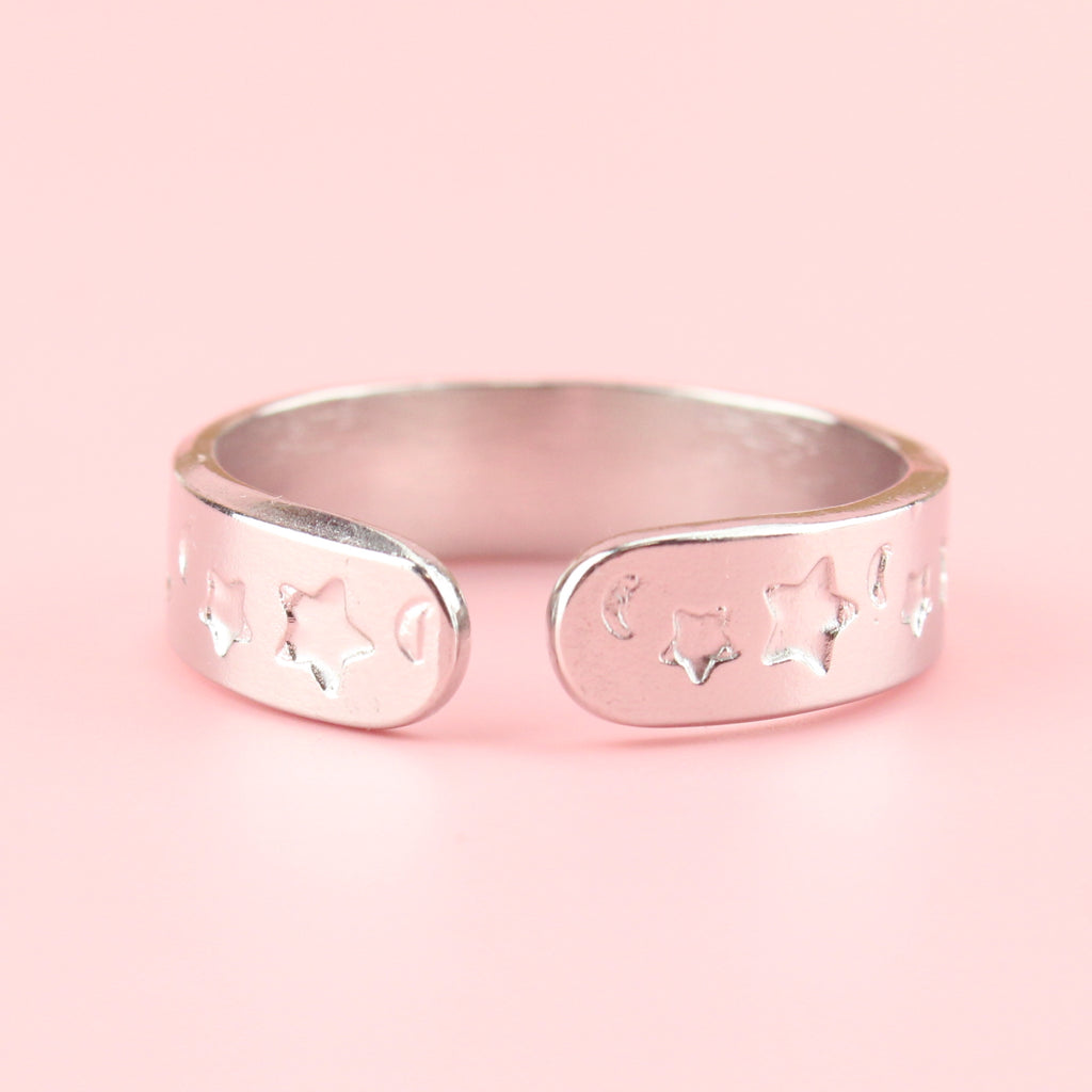 Stainless steel ring with moons and stars engraved on the band