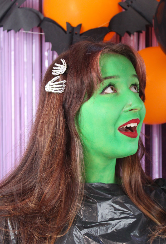 Model wearing Skeleton hand hair clips