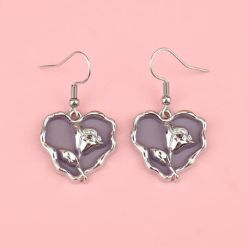 a base metal charm with a beautiful rose in the centre of a purple heart, suspended from sleek stainless steel ear wires