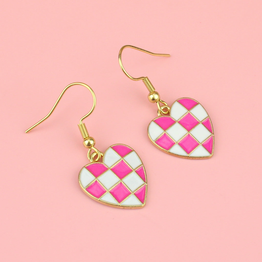 WHITE AND PINK CHECKERBOARD HEARTS MADE FROM GOLD PLATED BASE METAL ON GOLD PLATED STAINLESS STEEL EARWIRES