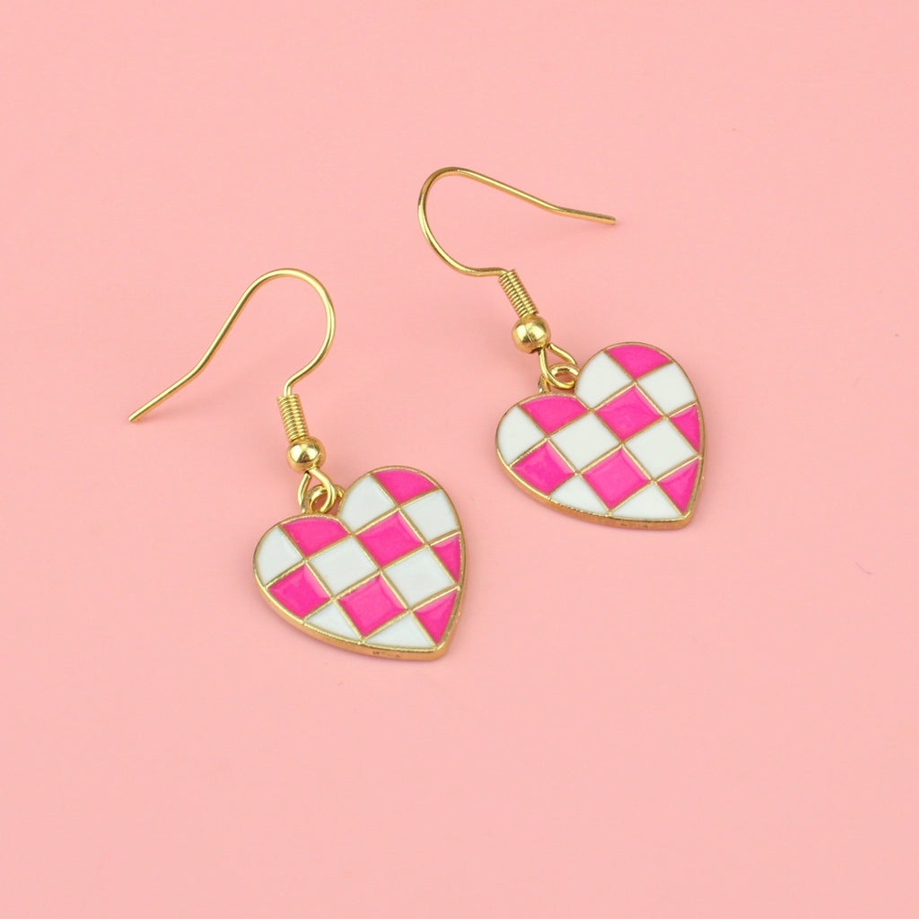 WHITE AND PINK CHECKERBOARD HEARTS BADE FROM GOLD PLATED BASE METAL ON GOLD PLATED STAINLESS STEEL EARWIRES