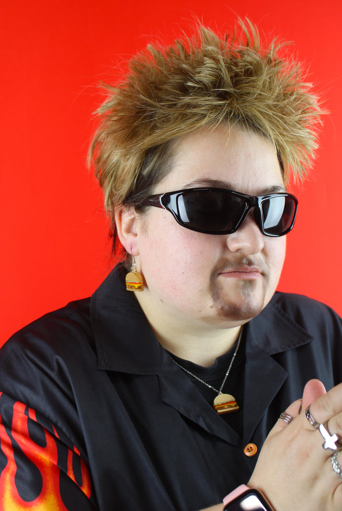 Model wearing Acrylic Burger pendant featuring lettuce, tomato and cheese on a stainless steel chain with matching earrings