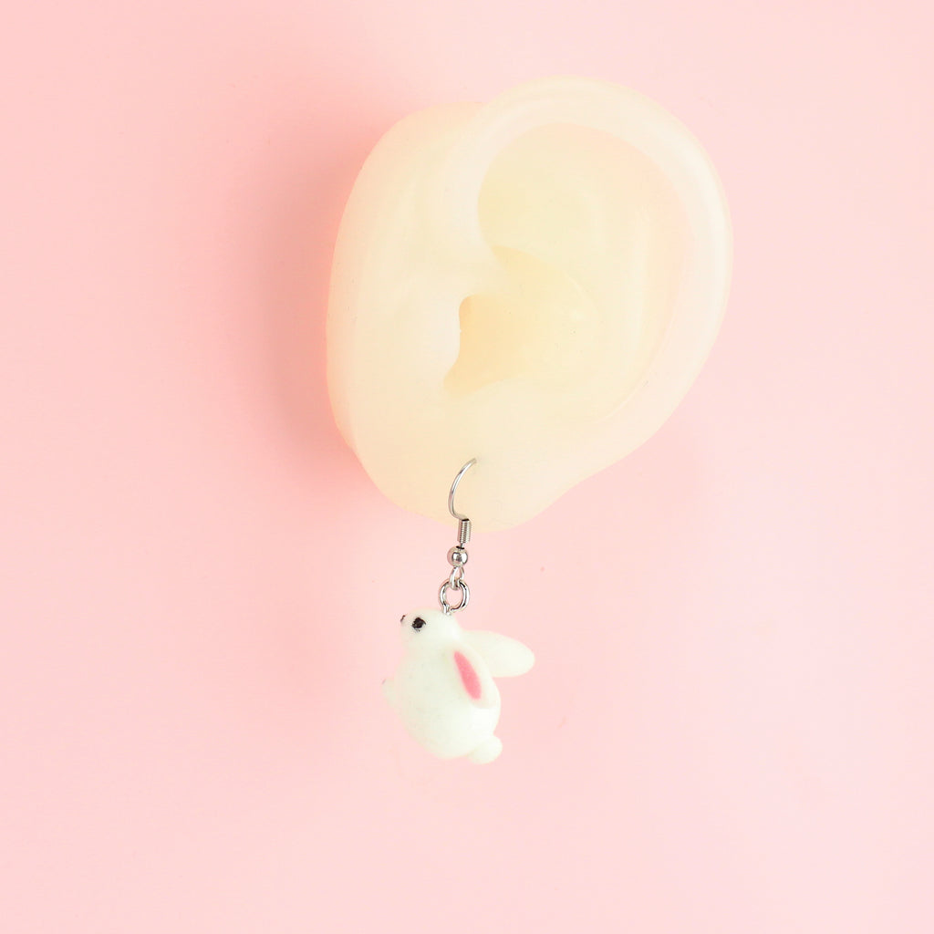 Ear wearing White fluffy 3d bunny charms on stainless steel earwires