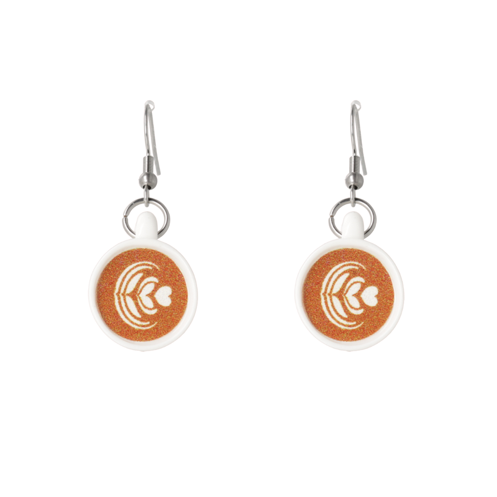 Pair of earrings with coffee cup charms on a white background