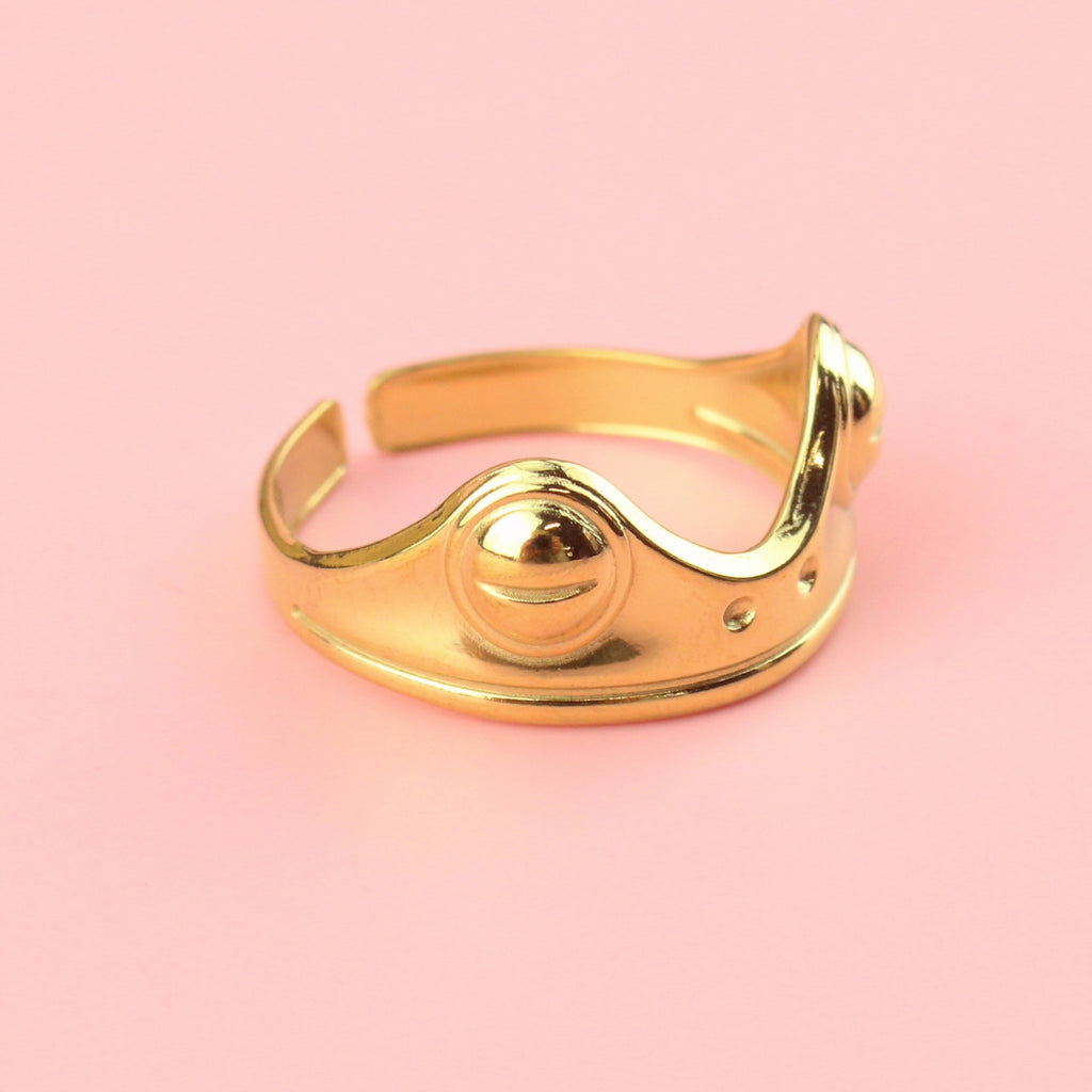 Gold plated stainless steel ring featuring two frog eyes and nostrils on the front of the ring