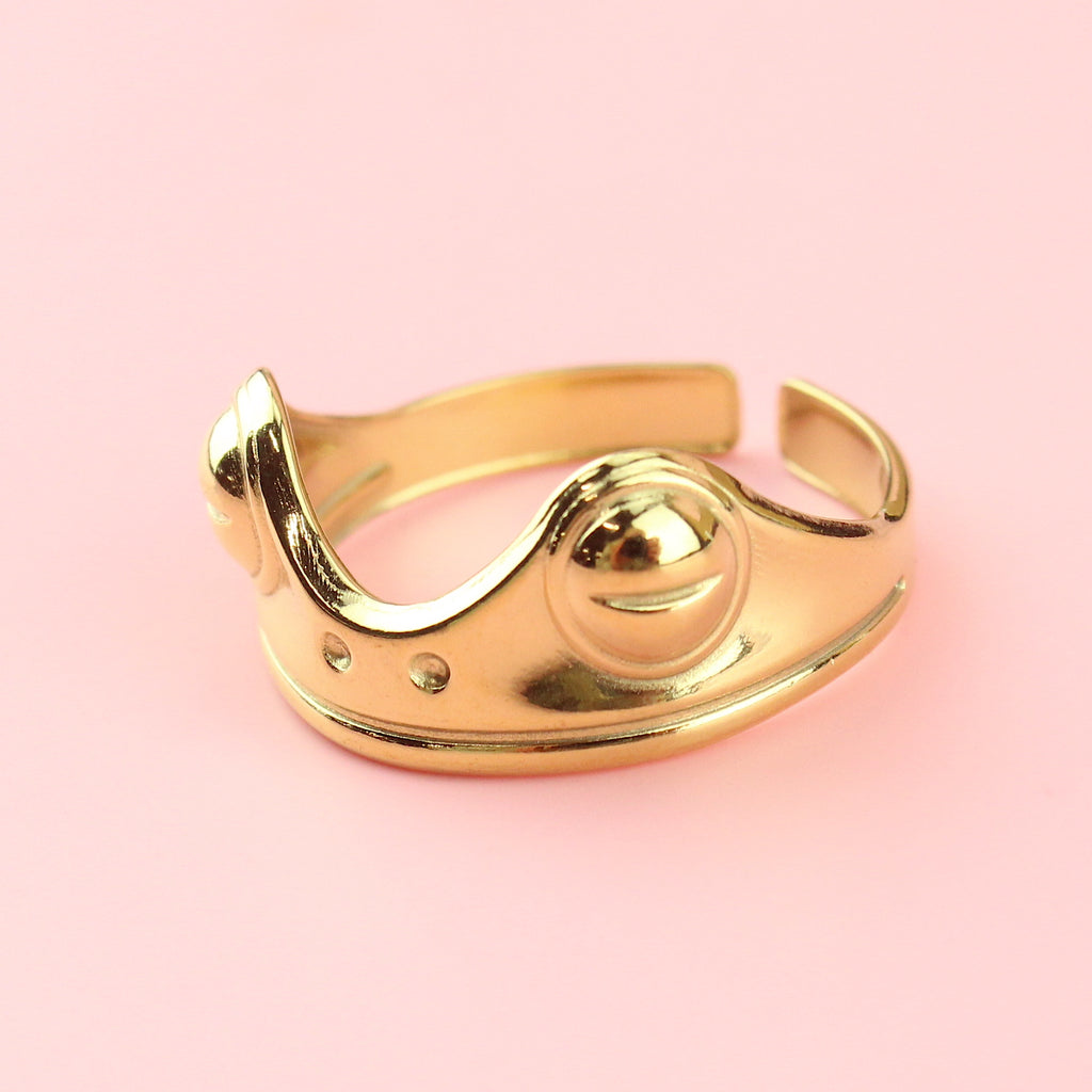 Gold plated stainless steel ring featuring two frog eyes and nostrils on the front of the ring