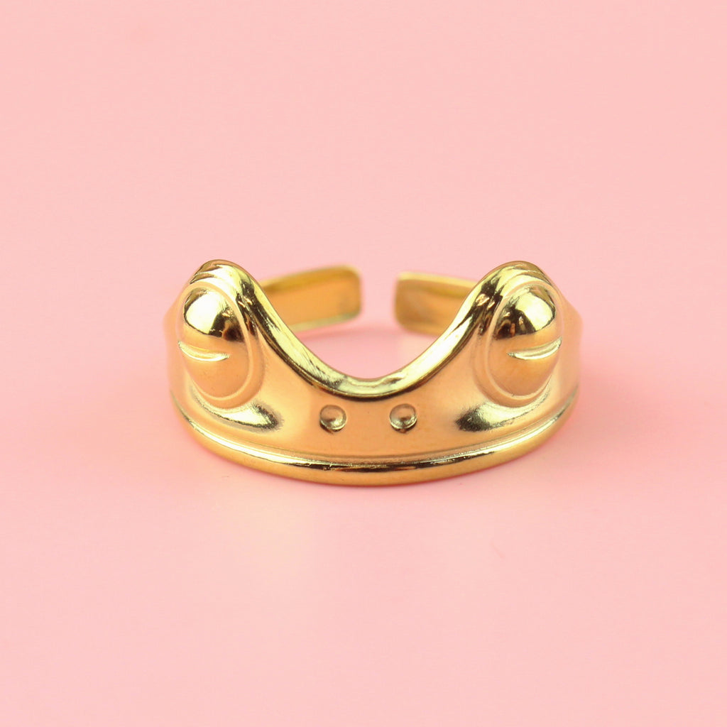 Gold plated stainless steel ring featuring two frog eyes and nostrils on the front of the ring