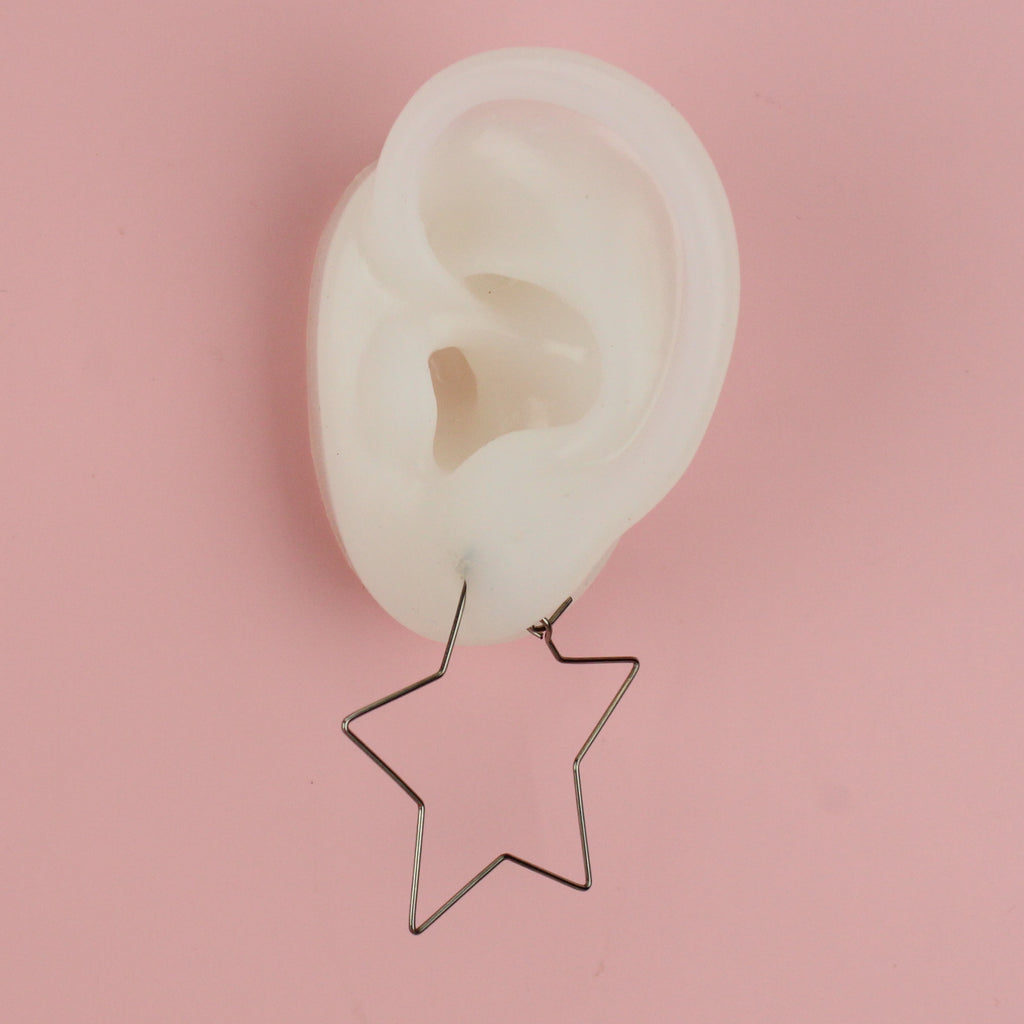 Ear wearinng Large Star Wire Hoop Earrings