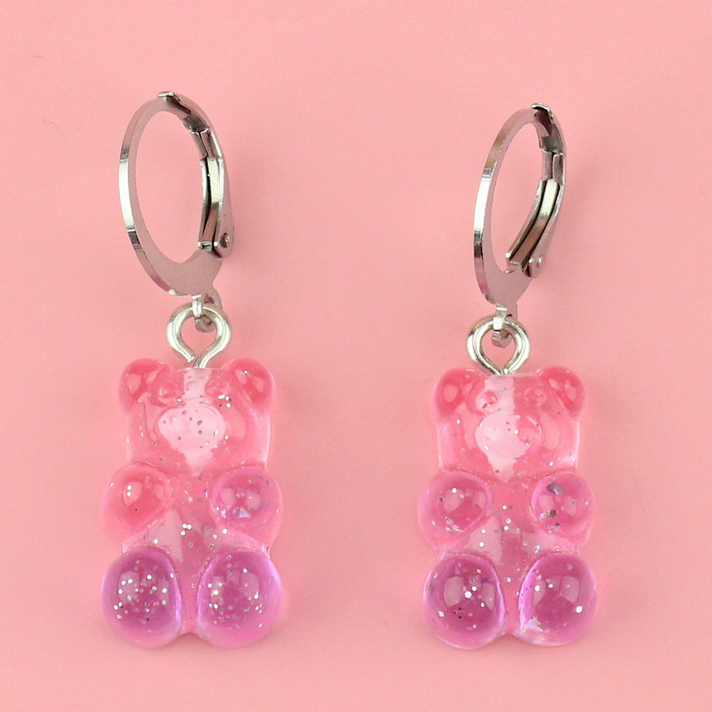 Pink and purple ombre gummy bear glittery charms on stainless steel huggie hoops