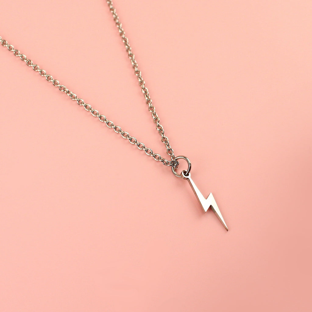 Lightning bolt pendant on a stainless steel chain