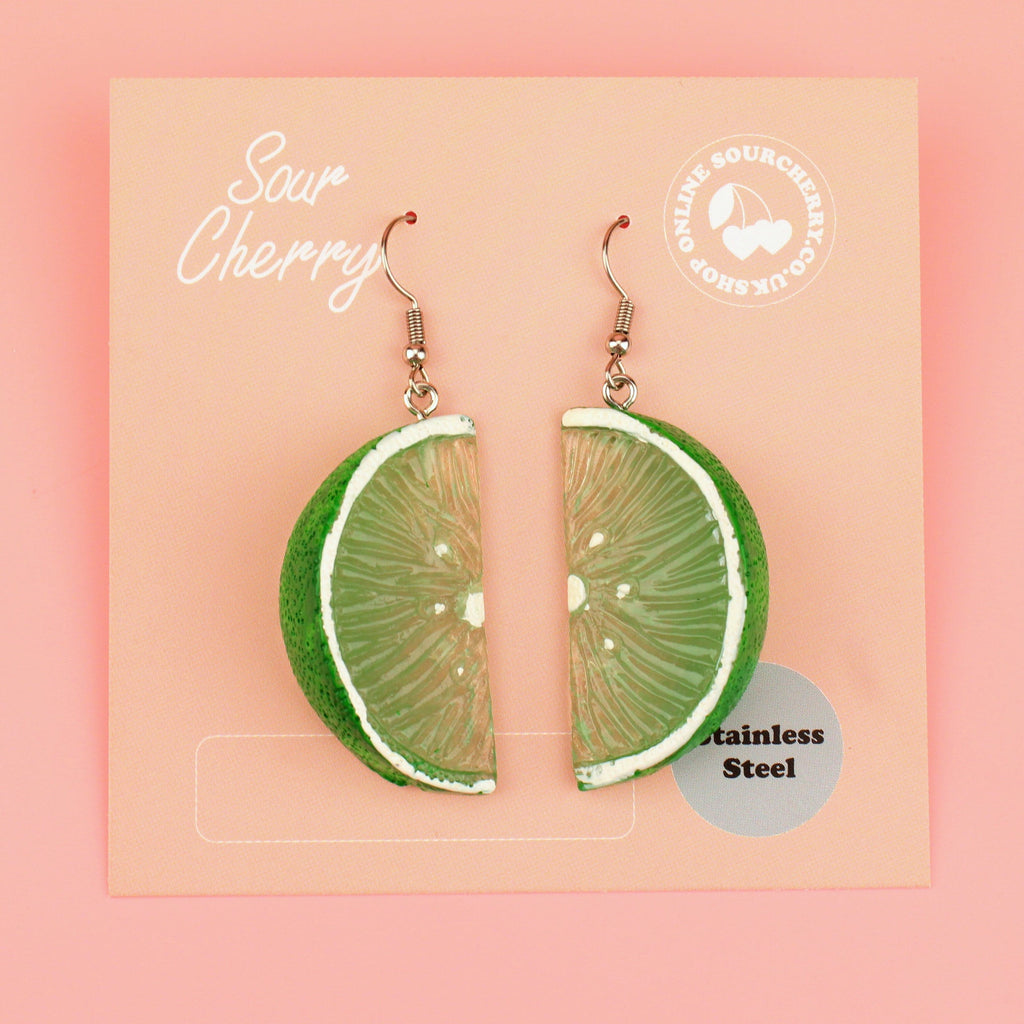 Lime segment charms on stainless steel earwires shown on the card