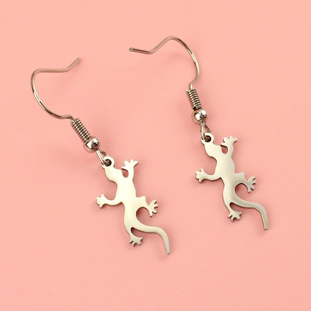 Stainless steel lizard-shaped charms on stainless steel earwires