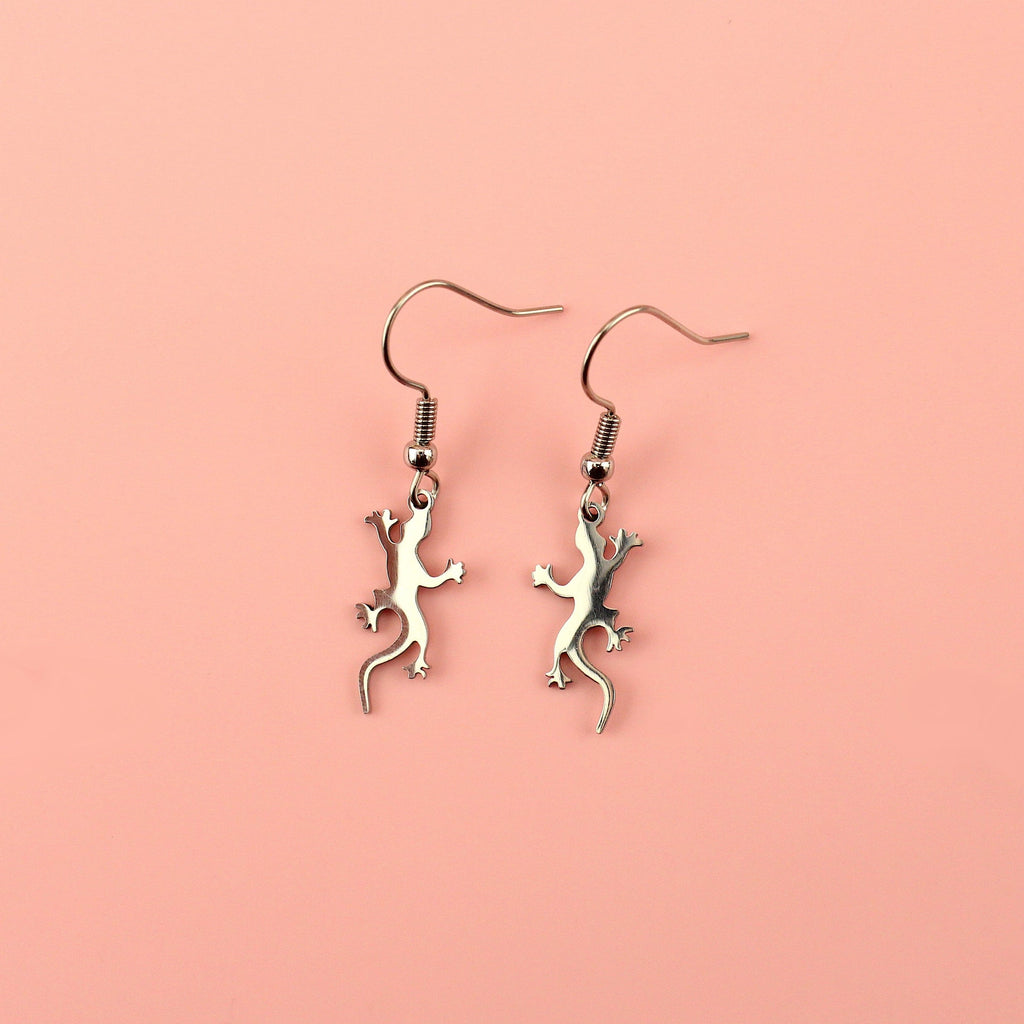 Stainless steel lizard-shaped charms on stainless steel earwires