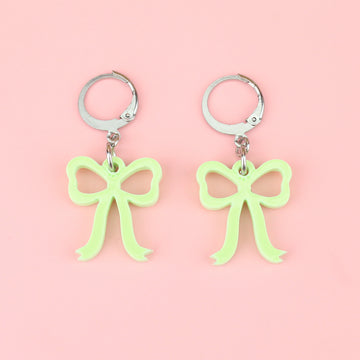 Green bow charms on stainless steel huggie hoops