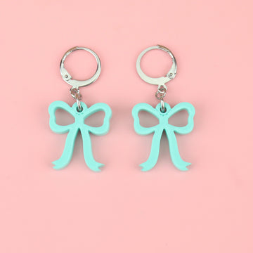 Turquoise bow charms on stainless steel huggie hoops