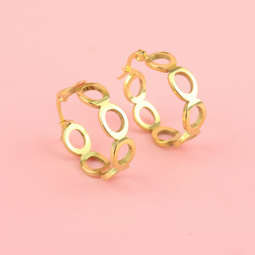 Gold plated stainless steel hoops with cut out circles