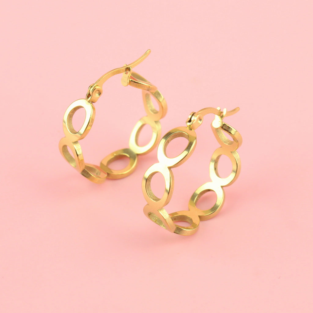 Gold plated stainless steel hoops with cut out circles