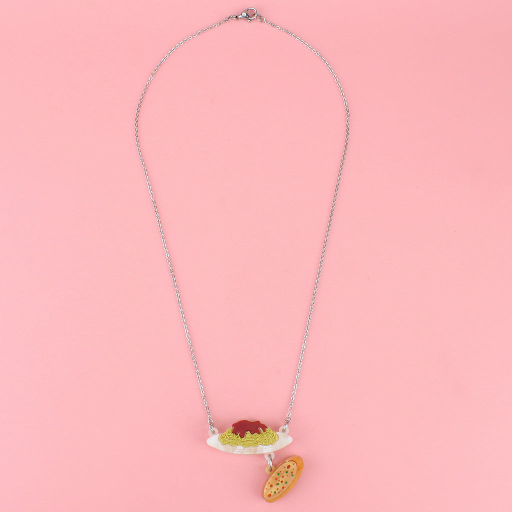 Spaghetti bolognese and garlic bread pendants on a stainless steel chain