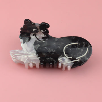 Black an white border collie claw clip with white outlines