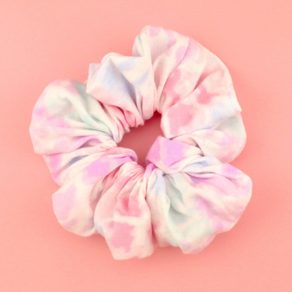  A pink, blue, purple and white tie dye scrunchie