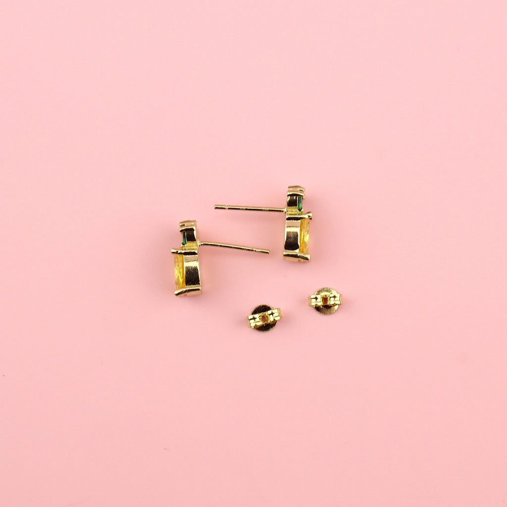 Pineapple shaped studs made from 16k gold plated base metal and cubic zirconia stones showing the backs