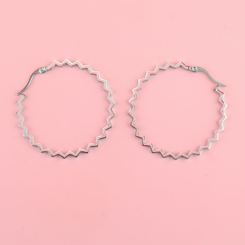 Pink zig zag shaped hoops