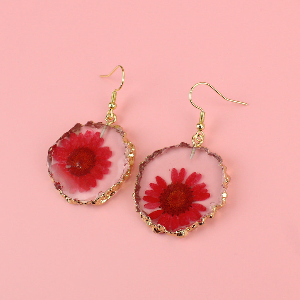 Pink pressed flowers earrings with a gold edge on gold plated stainless steel earwires