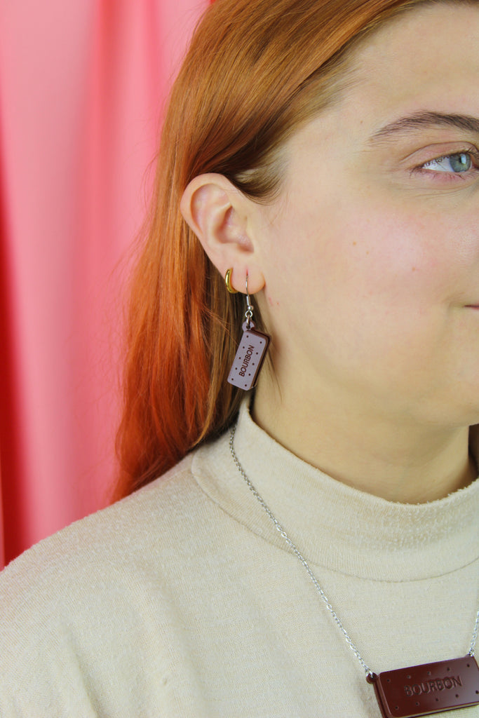 Bourbon biscuit earrings, worn by model
