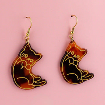 Resin tortoiseshell cat charms with a gold outline on gold plated stainless steel earwires 