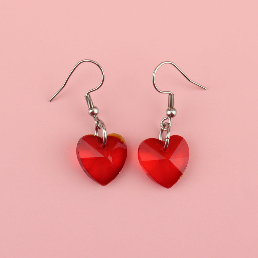 Red heart shaped glass charms on stainless steel earwires