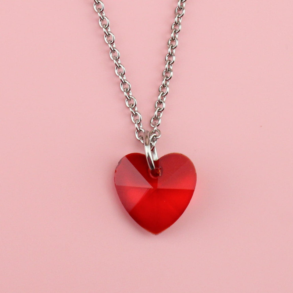 Stainless steel chain with red heart shaped pendant made of glass