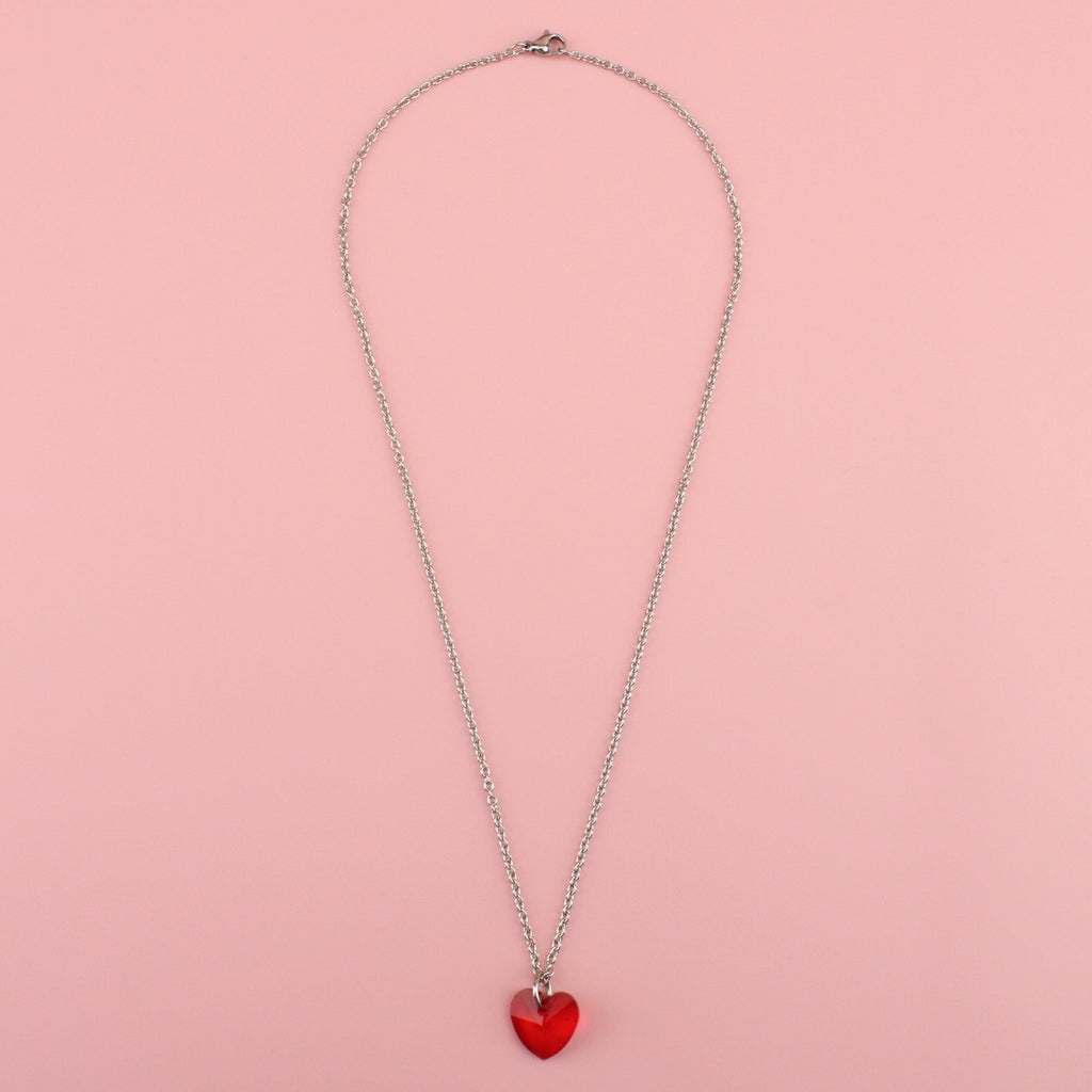 Stainless steel chain with red heart shaped pendant made of glass