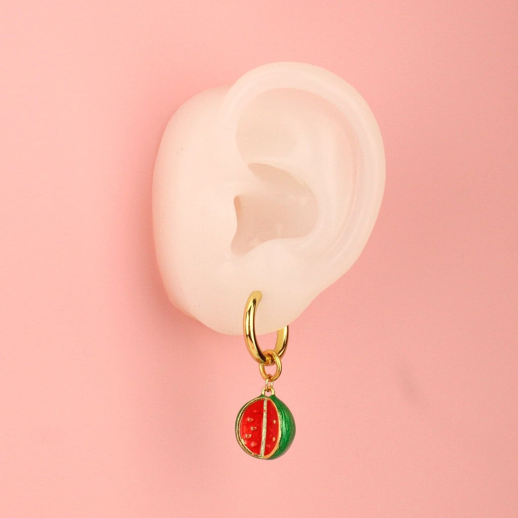 Ear wearing Rind and Shine Watermelon Earrings