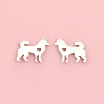 Stainless steel studs in the shape of a siberian husky with a cut out heart