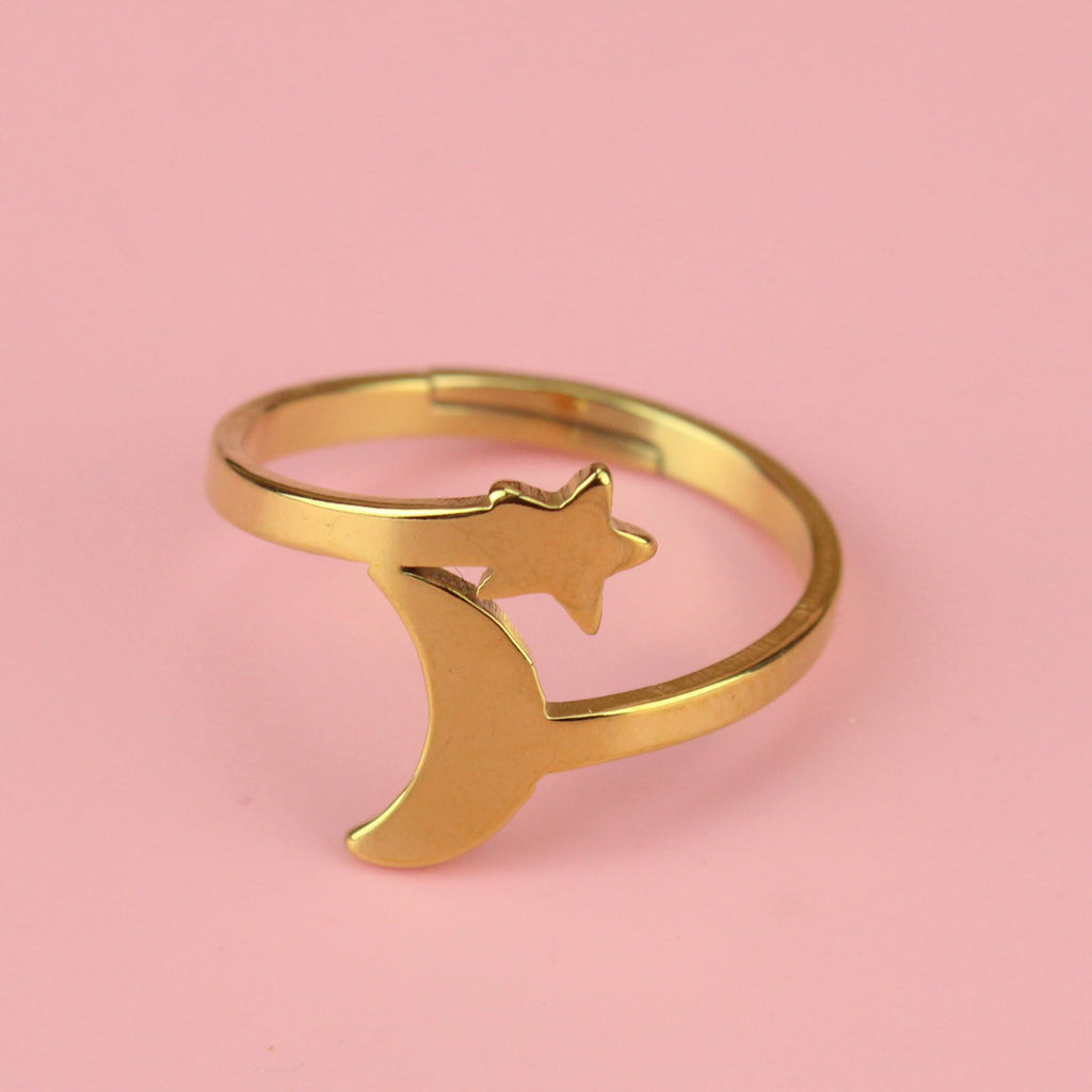 gold plated stainless steel loop dee loop style ring featuring a star at the top and crescent moon at the bottom