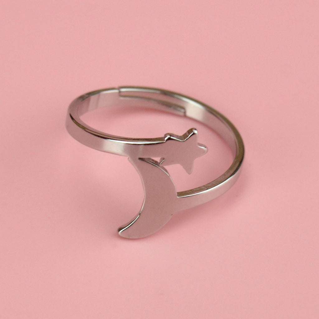  stainless steel loop dee loop style ring featuring a star at the top and crescent moon at the bottom