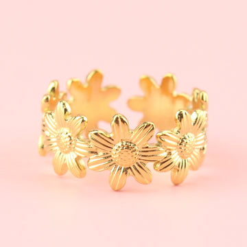 Ring made up of gold plated stainless steel sunflowers