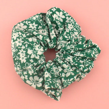 Dark green scrunchie with a white floral print