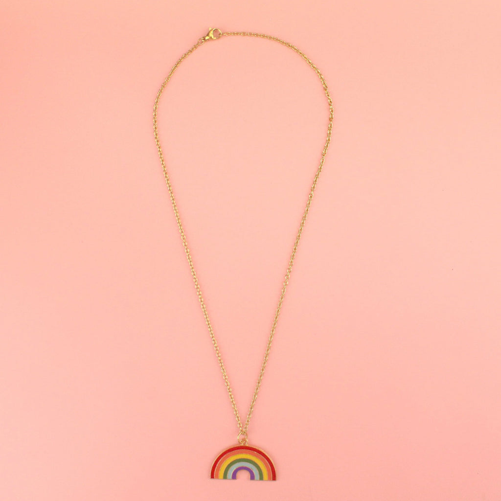 Gold plated base metal rainbow charm on a gold plated stainless steel necklace