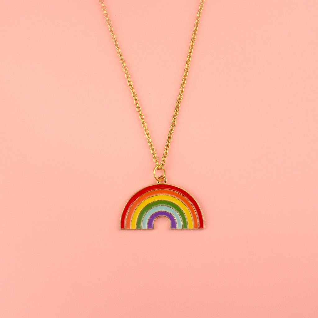 Gold plated base metal rainbow charm on a gold plated stainless steel necklace