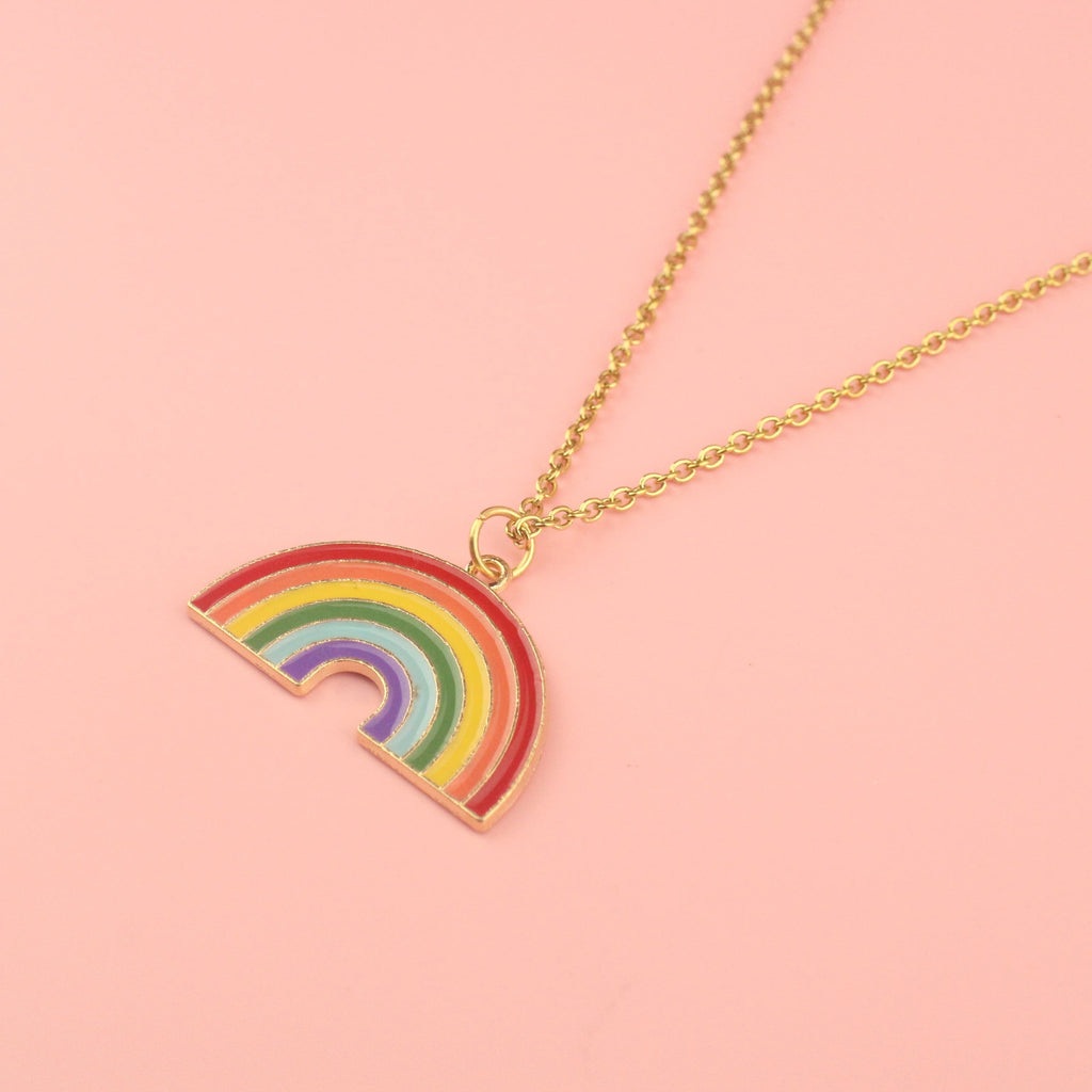 Gold plated base metal rainbow charm on a gold plated stainless steel necklace