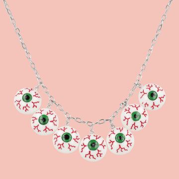 Seven Bloodshot eye pendants on an oval link stainless steel chain