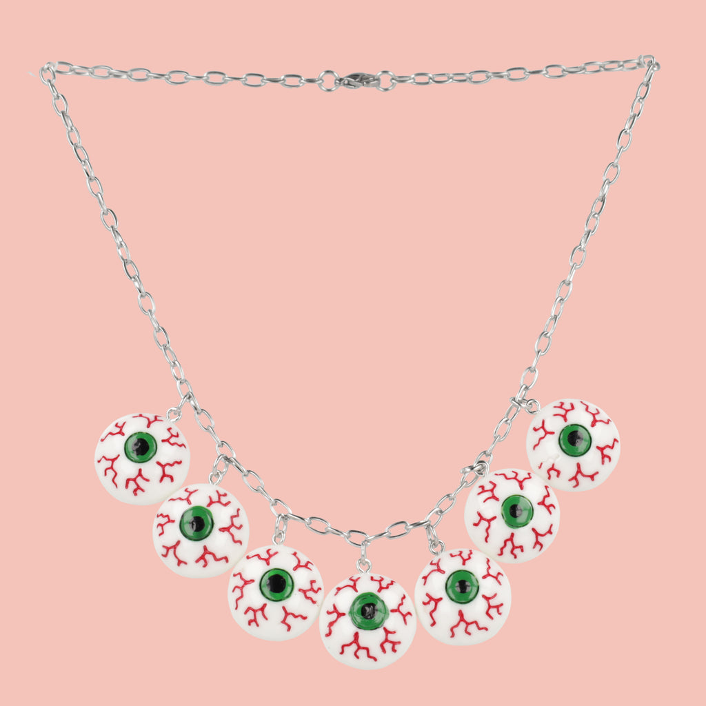 Seven Bloodshot eye pendants on an oval link stainless steel chain