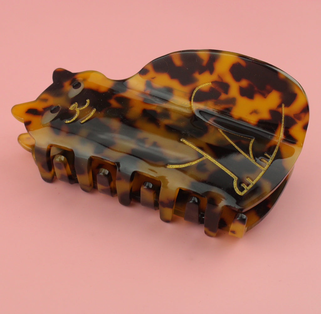 Tortoiseshell cat claw clip with gold outlines
