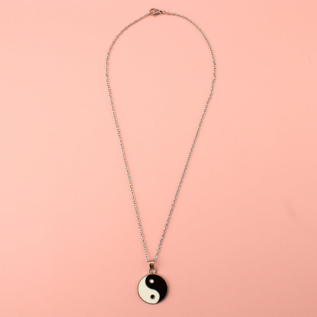 A Black & White Yin and Yang Pendant on a Stainless Steel chain