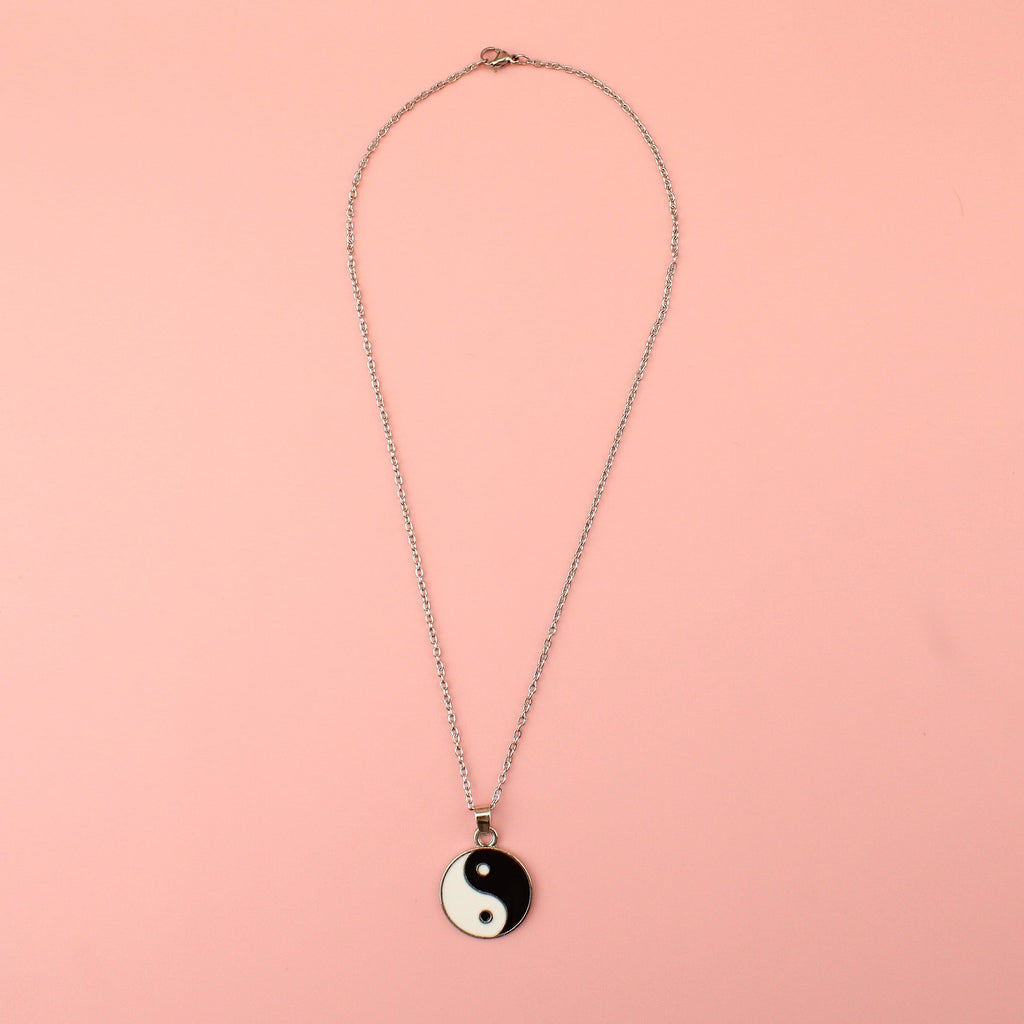 A Black & White Yin and Yang Pendant on a Stainless Steel chain