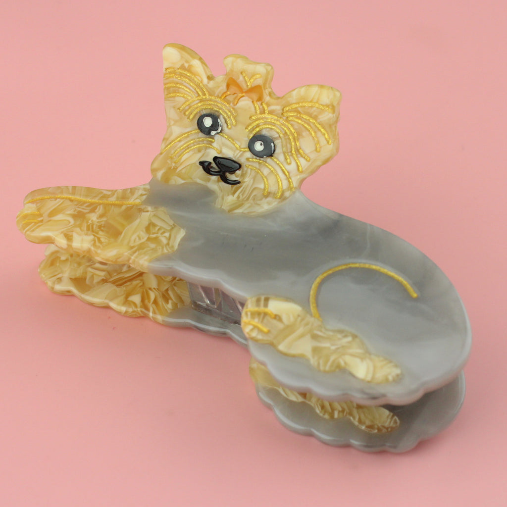Acrylic claw clip featuring a yorkshire terrier in a grey jumper