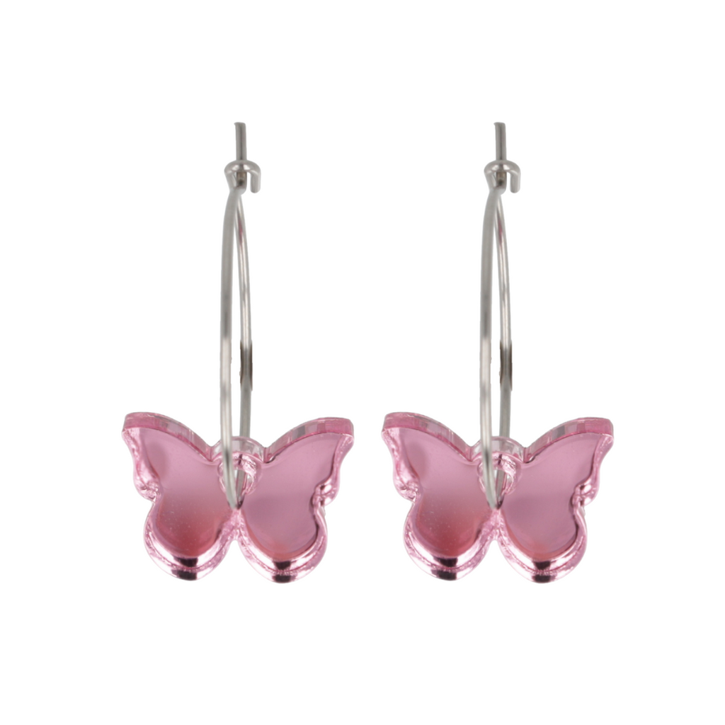 Pink butterfly earrings on a white background