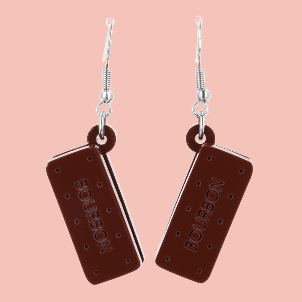 Bourbon biscuit earrings on a pink background