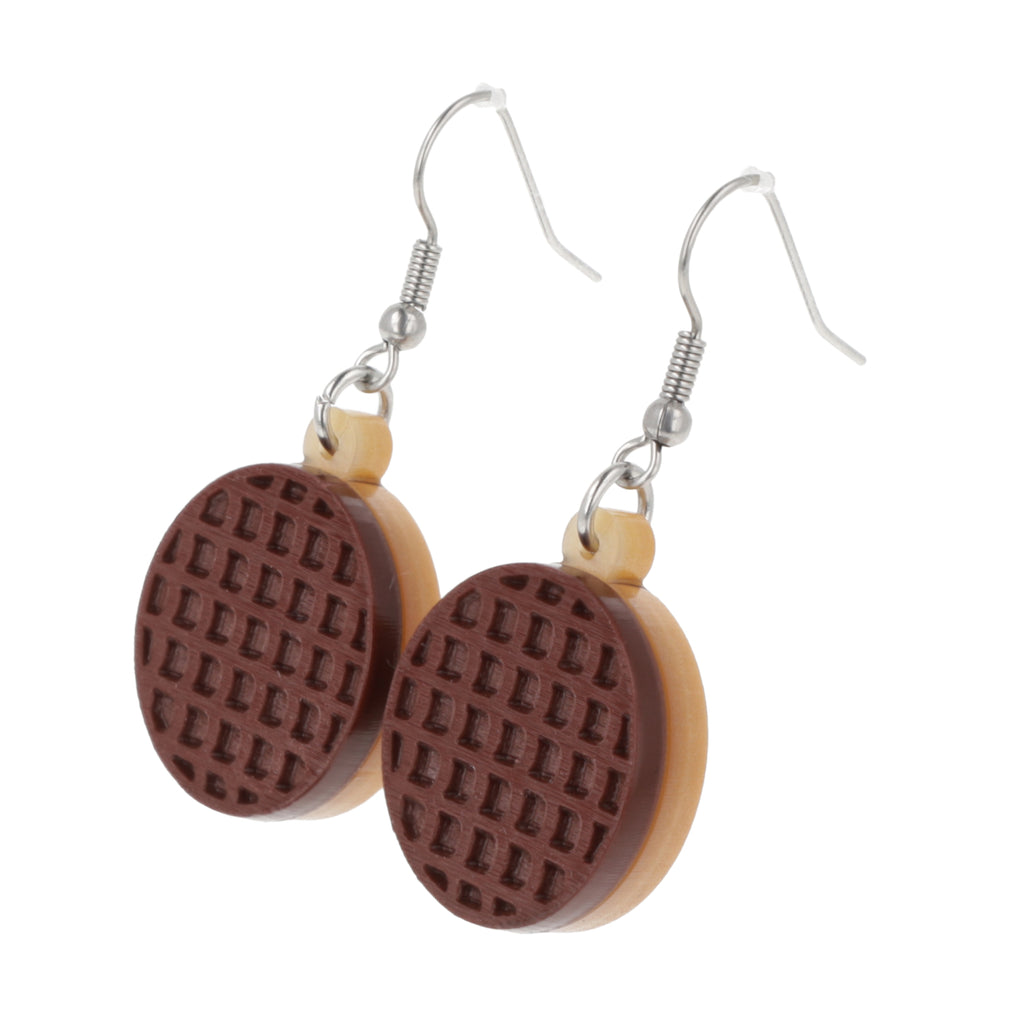 Chocolate digestive earrings on a white background